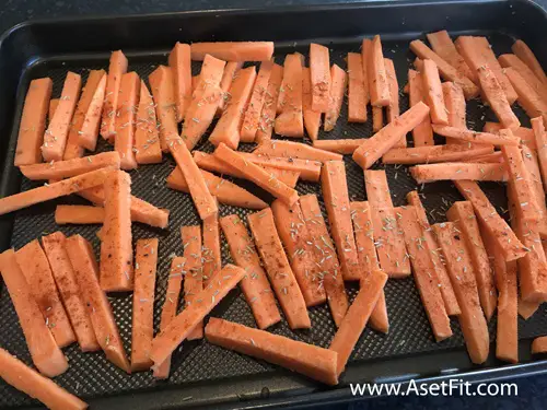Sweet potato French fries baked on tray